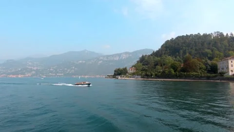Boat passing with scenic landscape behind, Lake Como, Bellagio - Italy, Europe Stock Footage 150662012