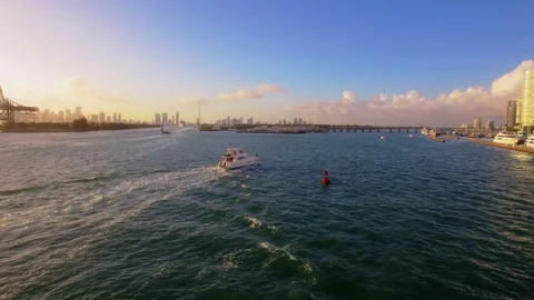 Boat Passing Through Biscayne Bay at Sunset Stock Footage 328166819