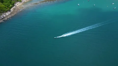 Boat Passing Through Ocean – Drone Footage Over Coastal Waters Stock Footage 337561610