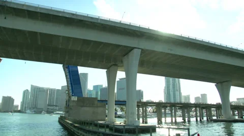 Boat passing under a bridge in Miami  Video stock 38518669