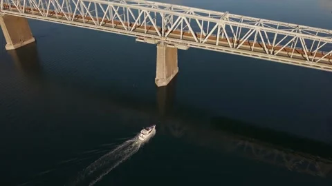 Boat Passing Under the Middelfart Old Little Belt Bridge Across the Blue Waters Stock Footage 346662473