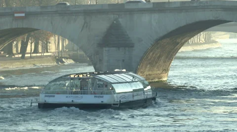 Boat passing underneath bridge on the Seine river Stock Footage 34301484