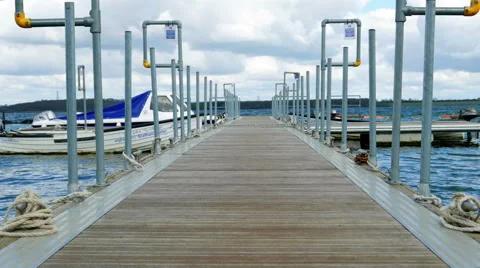 Boat Pier Moving on Waves, Lakeside Stock Footage 63781330