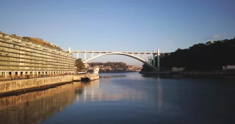 Boat point-of-view shot of Arrabida Bridge over Douro River in Porto, Portugal Stock Footage 114853784