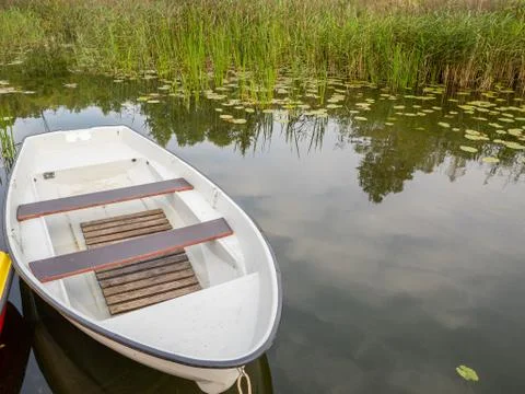 Boat on the pond. Photos