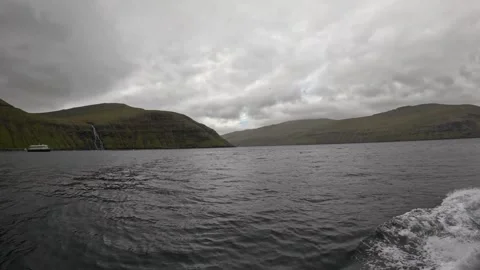 Boat POV sailing deeper into a dramatic fjord, Faroe Islands Stock-Footage 339270000