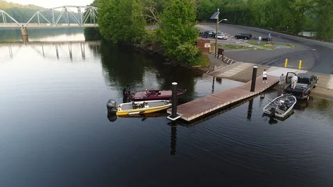 Boat pulling away from the dock Stock Footage 93401999