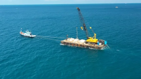 Boat pulling a crane, Koh Phangan, Thailand Stock Footage 107035429