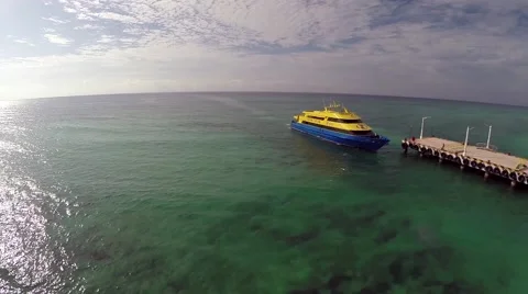 A boat pulls into harbor in Mexico Stock Footage 46908635