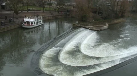 Boat by Pulteney bridge and weir Bath 1 Stock-Footage 47166344