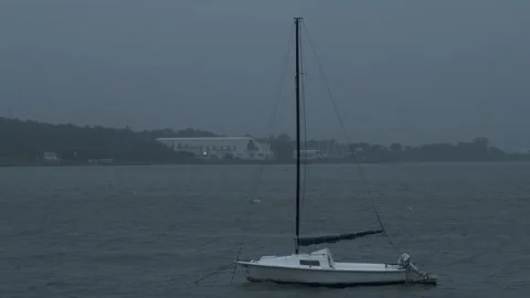 Boat on a rainy evening Stock Footage 264051914