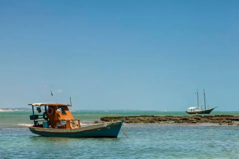 Boat on a reef Stock Photos