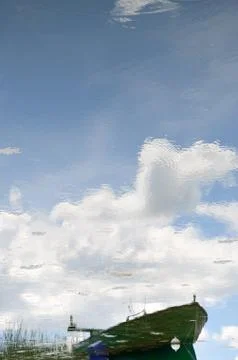 Boat reflection Stock Photos