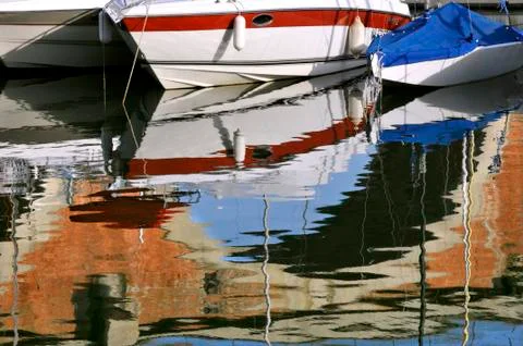 Boat reflection in water Stock Photos