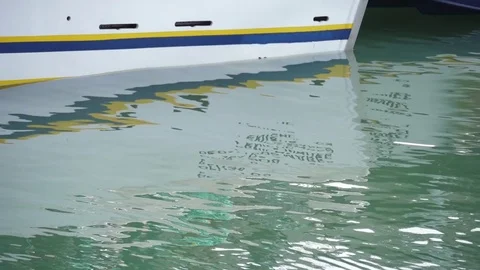 Boat reflection in water slow motion Stock Footage 76886769