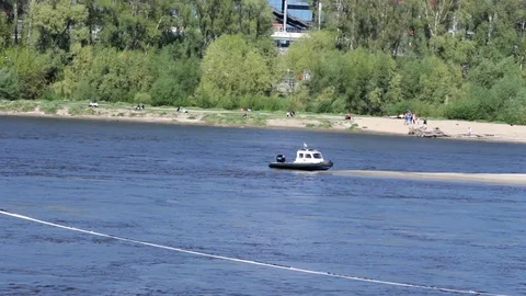 A Boat Resting On A Beach In The Middle Of A River Stock Footage 88763140