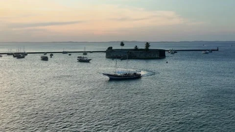 Boat Returning to Harbor at Sunset Stock Footage 297484071