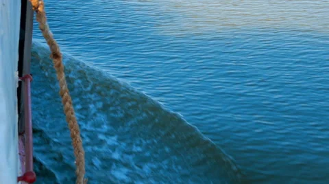 Boat in rhe ocean flows slowly while twilight 库存影片 65678301