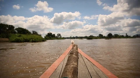 Boat ride on a cloudy day in Laos Stock Footage 104120171