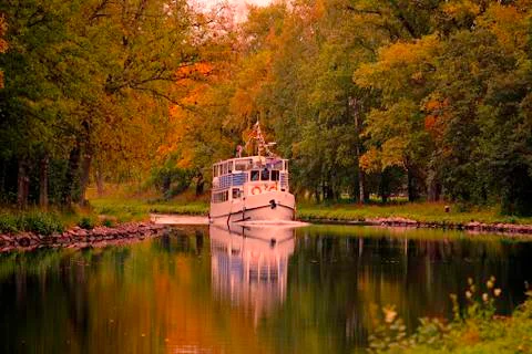 Boat ride into the fall Stock Photos