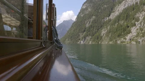 Boat ride on the lake with the mountain view Stock Footage 82284577