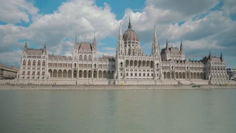 Boat ride through Danube, passing by Budapest Parliament, sunny Stock Footage 112502227