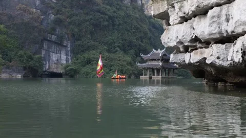 Boat Ride in Trang An Landscape Complex, Ninh Binh, Vietnam UNESCO Heritage Site Stock Footage 313622458