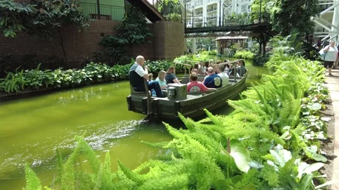 A boat ride &amp; tropical plants inside of Gaylord Opryland Resort, Nashville Stock Footage 201502337