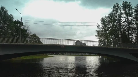 A boat ride under the bridge and the exit to the confluence of two rivers Stock Footage 77235658