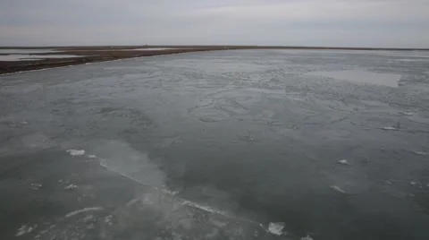 Boat riding through fast ice forming Stock Footage 51026327
