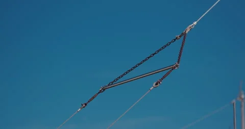 Boat rigging cables against blue sky Vídeo Stock 334338660