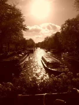 Boat on a river in Amsterdam Stock Photos