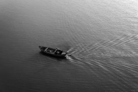 The boat in the river. B&amp;W Stock Photos