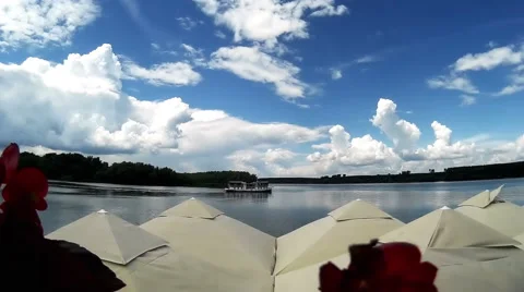 Boat on the river with cloudy sky Stock Footage 64212552