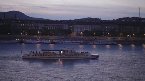 A boat on the river in the evening Stock Footage 56938039