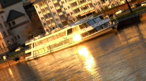 Boat on River evening sun reflection Stock Footage