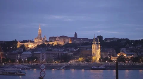 A boat on the river in front of the castle in Budapest Stock Footage 56937973