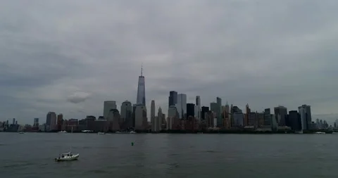 Boat on the river in front of Manhattan Stock Footage 149734732