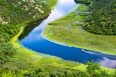 Boat on river in mountains Stock Photos