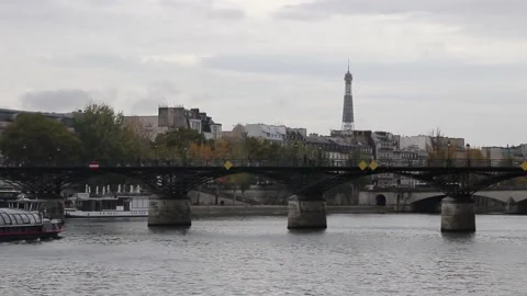Boat in the river seine with the silhouette of the Eiffel Tower. Paris. Stock Footage 142525558