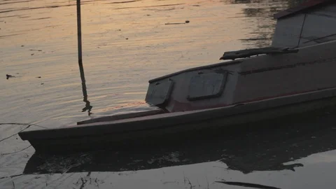 Boat in river at sunset Stock-Footage 110954287