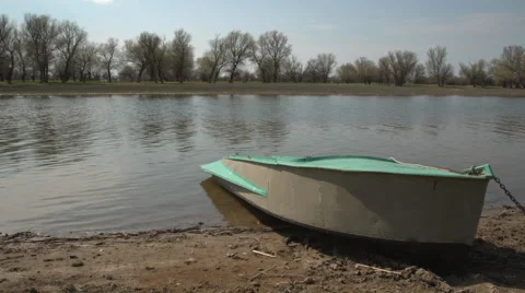 Boat at the riverside Stock Footage 61954035