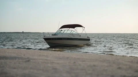 Boat on rocking on beach Stock-Footage 194961711