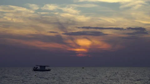 A boat rocks on calm waves Stock Footage 258953785