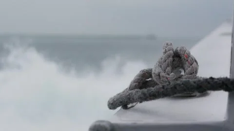 Boat Rope Knot Sways on Ocean Waves Stock Footage 323343640