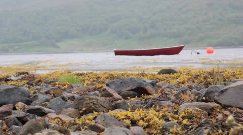 Boat on rough loch Stock Footage 25849206