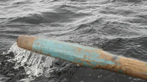 Boat Rowing through water Stock Footage 102006994