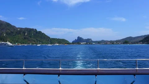 Boat run out from Phi Phi island on summer holiday with beautiful seascape Stock Footage 107880671
