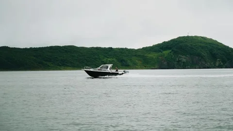 The boat is rushing across the water surface Stock Footage 284218929