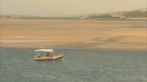 A boat sailing along a river 스톡 동영상 38598493